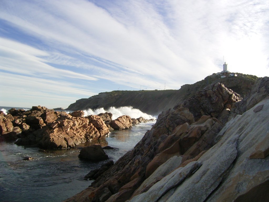 lighthouse beach clouds sky  photography