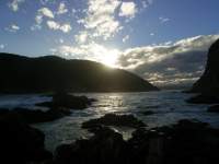 ocean beach sunset water reflection 